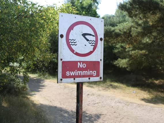 Swimmers should take care when taking a dip in the water during the hot weather, , council leaders have warned. Pic: Chris Radburn/PA Wire.