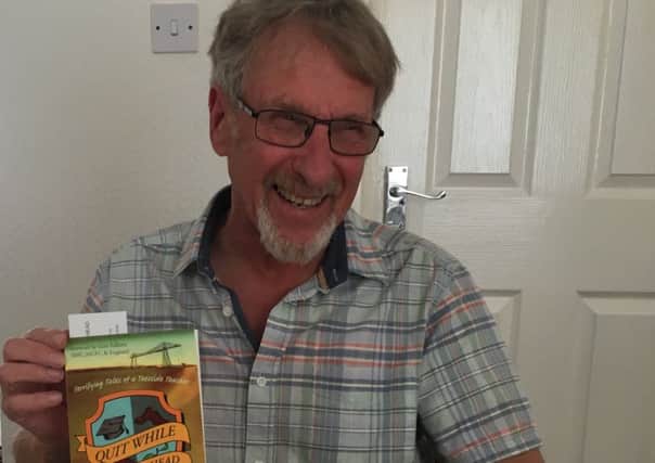 Bryan Cross with his book.