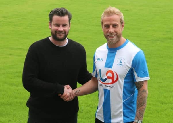 Matthew Bates with summer signing Andrew Davies. Photo courtesy of Hartlepool United.