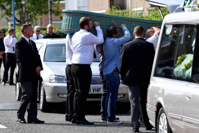 Mark Pinchen's coffin is made ready to be carried into Holy Trinity Church, Davison Drive, Hartlepool Picture by FRANK REID