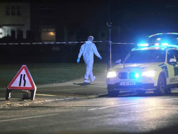 The scene in Oxford Road on Friday night where a woman was murdered in a suspected targeted attack