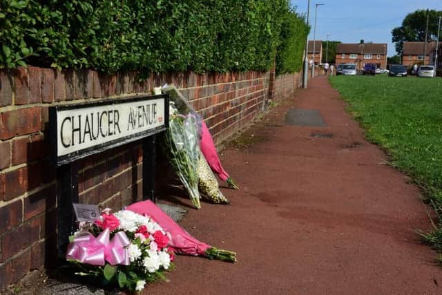 Flowers have been left on the corner of Chaucer Avenue, off Oxford Road, in tribute to the woman.