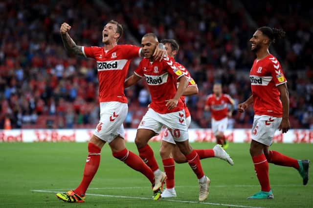 Middlesbrough's Aden Flint (left) celebrates against Sheffield United.
