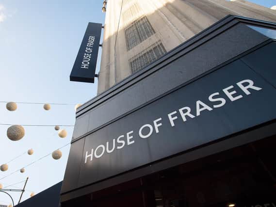 Mike Ashley's Sports Direct has agreed a deal to buy troubled retail chain House of Fraser out of administration.