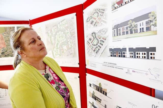 Tracy Woodall looking at the Health Village plans during a consultation event, held at Alice House Hospice, Wells Avenue. Picture by FRANK REID