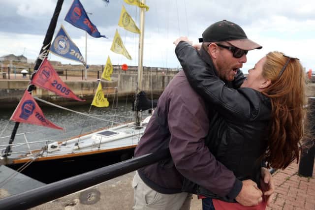The Black Diamond of Durham return to Hartlepool Marina after recording its best ever performance in the Tall Ships Race. Skipper Calvyn White hand greets his girlfriend Rachel Carroll. Picture: CHRIS BOOTH