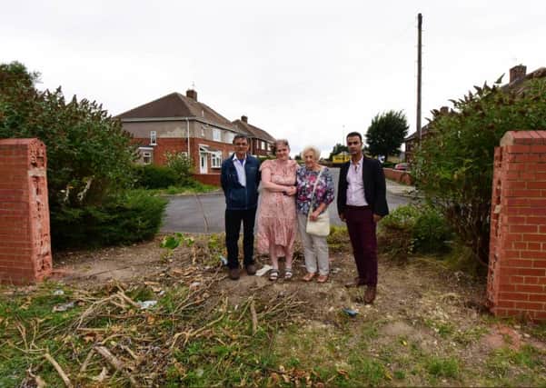 Some of the residents of Lealholm Road, Hartlepool, where a cul-de-sac wall has been removed in plans for new housing.