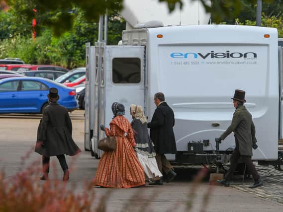 Actors in period dress during filming at the National Museum of the Royal Navy Hartlepool