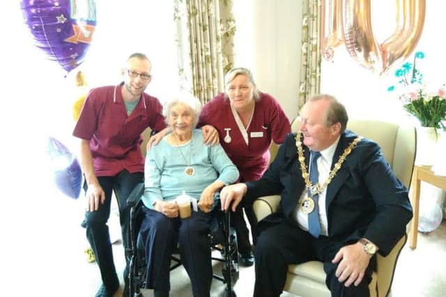 Mabel Longhorn, known as Winnie, with  Rossmere Park Care Centre staff and Hartlepool Mayor Allan Barclay and care workers Regan Sutheran and Michael Towler.