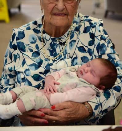 Geraldine with her great-great granddaughter, three weeks old Harper Harding.