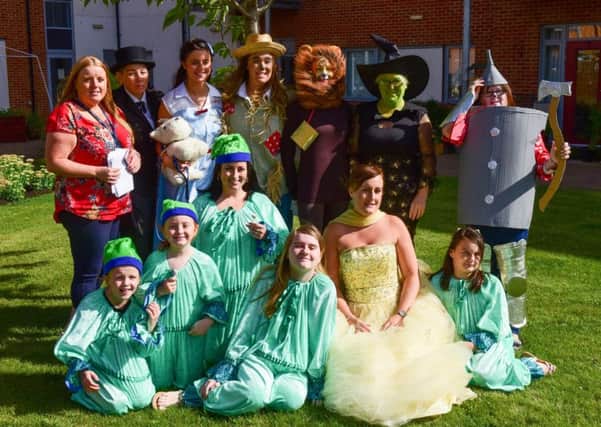 The care team cast of Wizard of OZ.