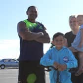 Lewin with dad Suli, mam Lynsey and little sister Mia.