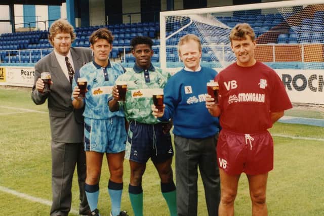 Lenny Johnrose, centre, raises a glass in 1993 to toast Hartlepool United's sponsorship deal with the town's Camerons Brewery.