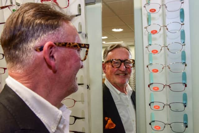 Harry Cole with retail director of Specsavers Hartlepool, Ian Walker