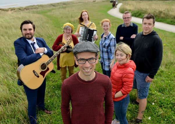 Performers Writer Daniel Bye (front) with (left to right) Michael Blair, Jane Holman, Alice Blundell, Anne Rigby, Boff Whalley, Andy Jennings and Morag Iles at the coastal path at Crimdon. Picture by FRANK REID