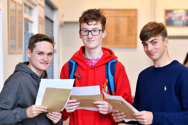 Daniel Liddell, Elliott Fox and Ben Briggs with their GCSE results at High Tunstall College of Science
