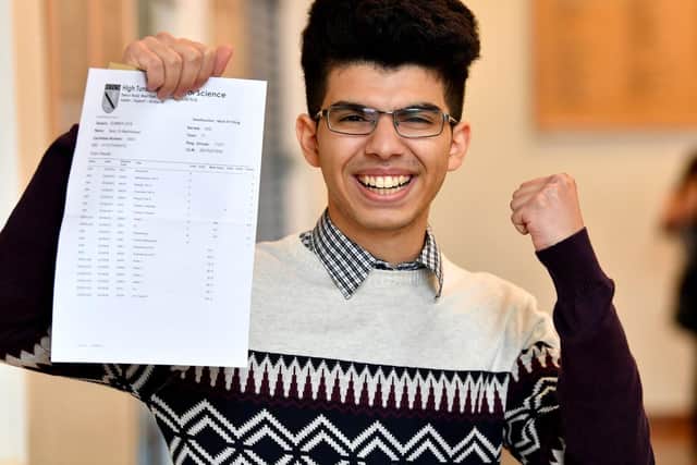 Belal El-Mashhararwi with his GCSE results