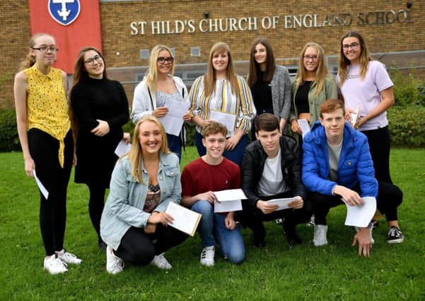 Pupils at St Hild's Church of England School, after they collected their GCSE results. Picture by FRANK REID