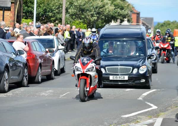 Funeral of Keith Fisher with son Mike Fisher leading escort on Keith's Yamaha bike