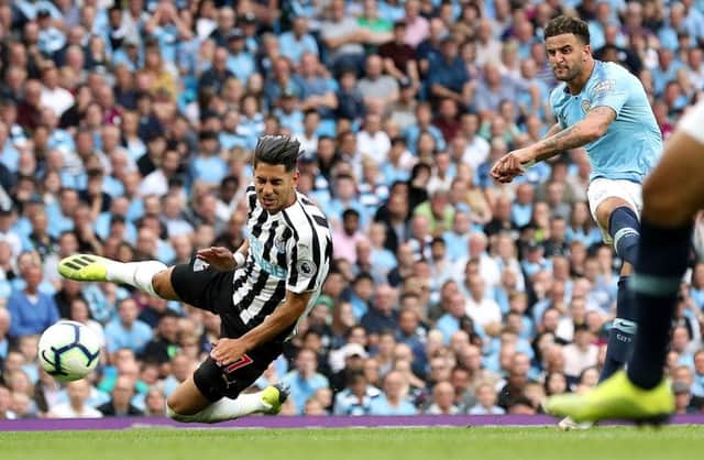 Manchester City's Kyle Walker (right) scores his side's second goal of the game during the Premier League match at the Etihad Stadium, Manchester. PRESS ASSOCIATION Photo.
