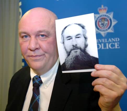 Detective Supt Tony Hutchinson with picture of John Darwin during a press conference after he re-appeared back from the dead.