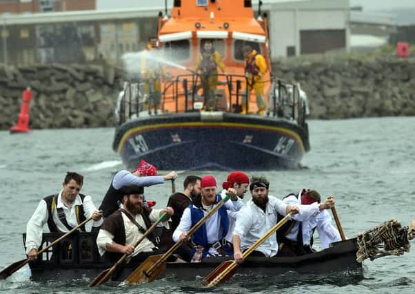 The pirates team heading for the shoreline.