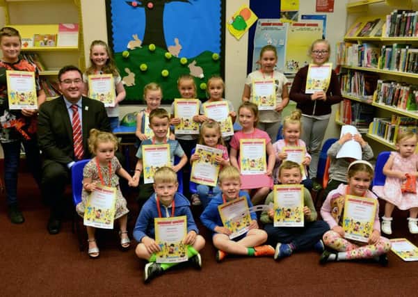Children who completed Hartlepool Libraries' Summer Reading Challenge at Headland Library received awards from Councillor Mike McLaughlin. Picture by Frank Reid
