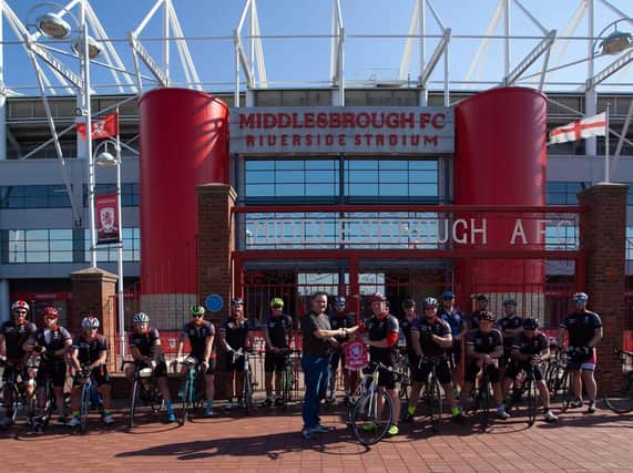 Marc Hall with the cyclists at Middlesbrough Riverside Stadium. Picture by Andrew Gill.