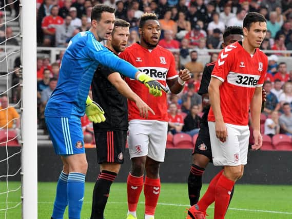 Britt Assombalonga and Stewart Downing picture in friendly against Sunderland.
