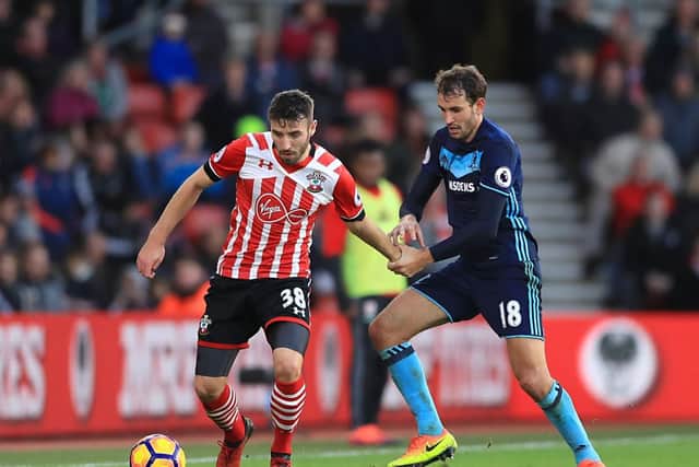 Sam McQueen is action against Middlesbrough for Southampton
