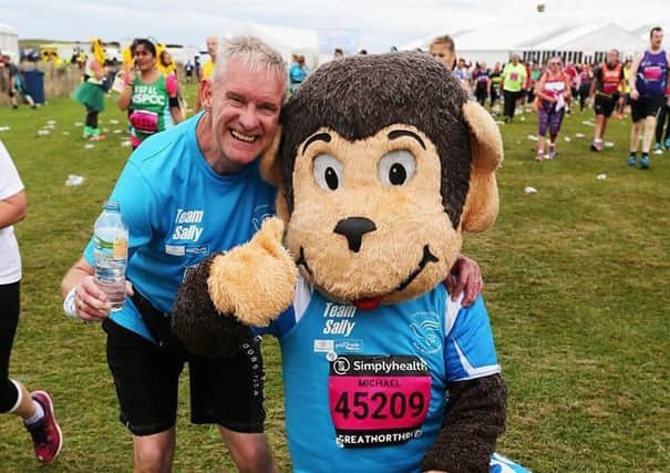 Phil Holbrook with Hartlepool United mascot H'Angus after last year's Great North Run.