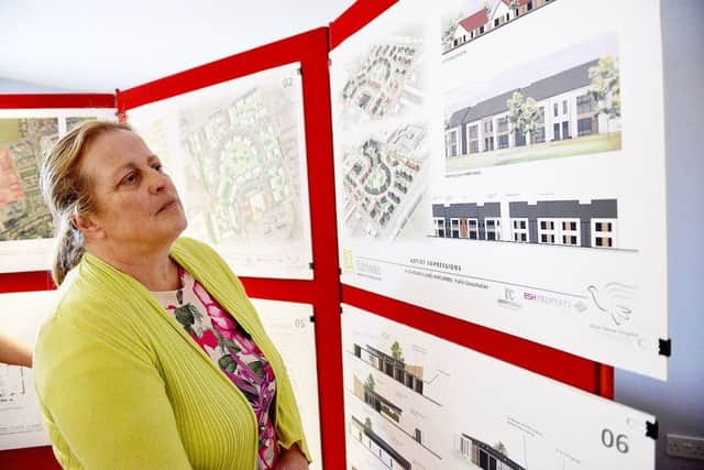 Tracy Woodall looking at the Health Village plans during a consultation event, held at Alice House Hospice, Wells Avenue. Picture by FRANK REID