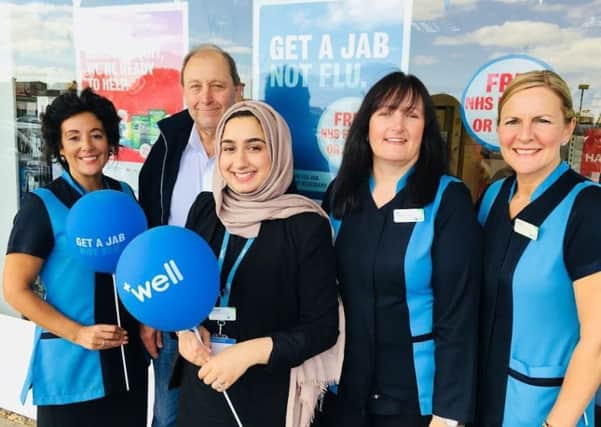 From left, Fens Well Pharmacy assistant Angela Fannan, Councillor Bob Buchan, pharmacy manager Yasmeen Afsar, and technicians Liz Doyle and Shirley White.