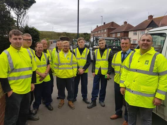From left, the eight new additions to the environmental workforce - Patrick Frain, Simon Marshall, Peter Corbett, Kevin Bolton, Barry Collins, Matthew Black, Luke Jones and Kyle Bates  pictured with Garry Jones, the Councils Team Leader for Cleansing and Grounds Maintenance, and Councillor Stephen Akers-Belcher.