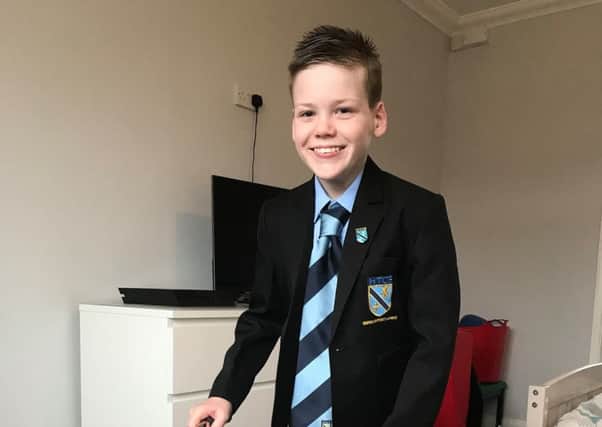 Alfie in his new school uniform