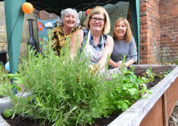 Opening of St Mary's community garden. From left Sue Ainslie, Jane Johnson and Marjorie Alldred