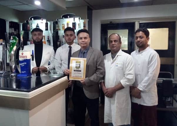 Owner Syed Dulal, with sons Shabab Syed and Shujath Syed, and chefs Syed Mijan and MD Nazir Ahmed.