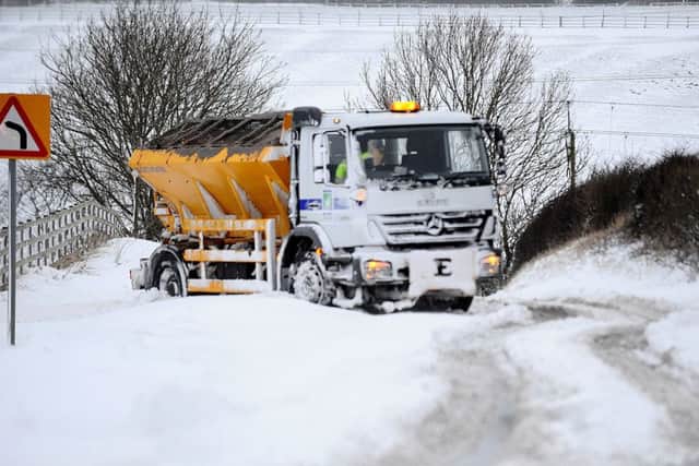 Weather Hartlepool Borough Council critter stuck in drifting snow on the Elwick Village to Hartlepool road heading to Hartlepool. Picture by FRANK REID