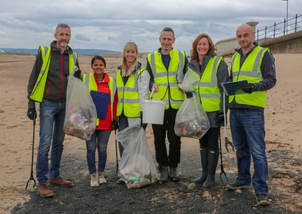 Staff from Kerry Foods take part in a beach clean at Seaton Carew. Picture by Tom Banks