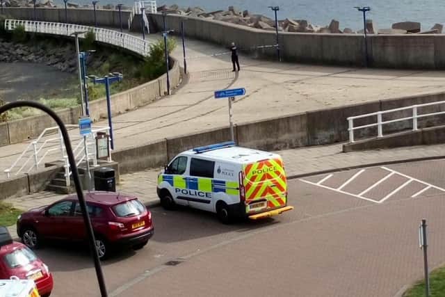 South Pier was cordoned off after a male's body was found. Picture by George Lowther