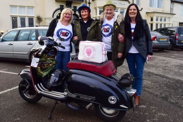 From left, Lisa Kitson, Carol Macdonald, Sandra Clark and Roz Wilkinson pose with a scooter at a previous March Of The Mods in Hartlepool.
