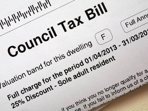 The company claims residents are paying too much council tax due to being in the wrong band.