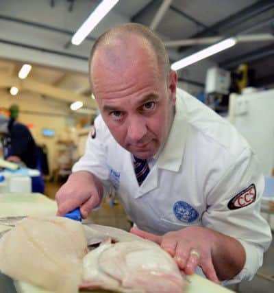 Fishmonger of the year Alan Barker from Hodgson Fish at work. Picture by FRANK REID