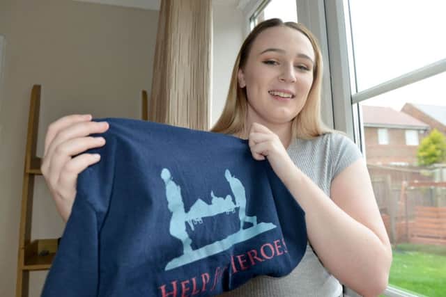 Shauna-Leigh Winspear holding a Help for Heroes T-shirt. Picture by FRANK REID