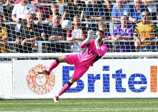 Hartlepool goalkeeper Scott Loach makes a save during the Vanarama National League match between Maidstone United  and Hartlepool United at the Gallagher Stadium.