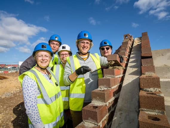 Revd Claire lays final brick for the new Wynyard CofE Primary School with members of the PCC and Headteacher present. PIcture: Keith Blundy