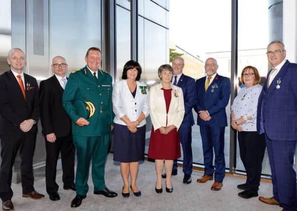 Martin Fletcher from Hartlepool (second left) with Lord-Lieutenant Susan Winfield (fifth from right) and attendees at the Queen's Medal ceremony