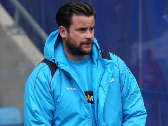 Matthew Bates on the sidelines at the Shay.