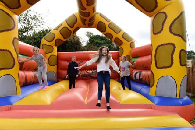 The owners of The Raby Arms, Front Street, Hart Village, celebrated their 1st anniversary on Saturday with various activities, including a bouncy castle.