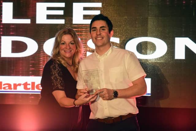 Lee Dodgson who won the Fundraiser of the Year category at the 2017 Best of Hartlepool Awards. He received his trophy from Joy Yates, the Mail's Editorial Director.
